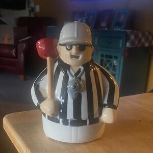 Hallmark Joking in the John Referee that talks with movement.